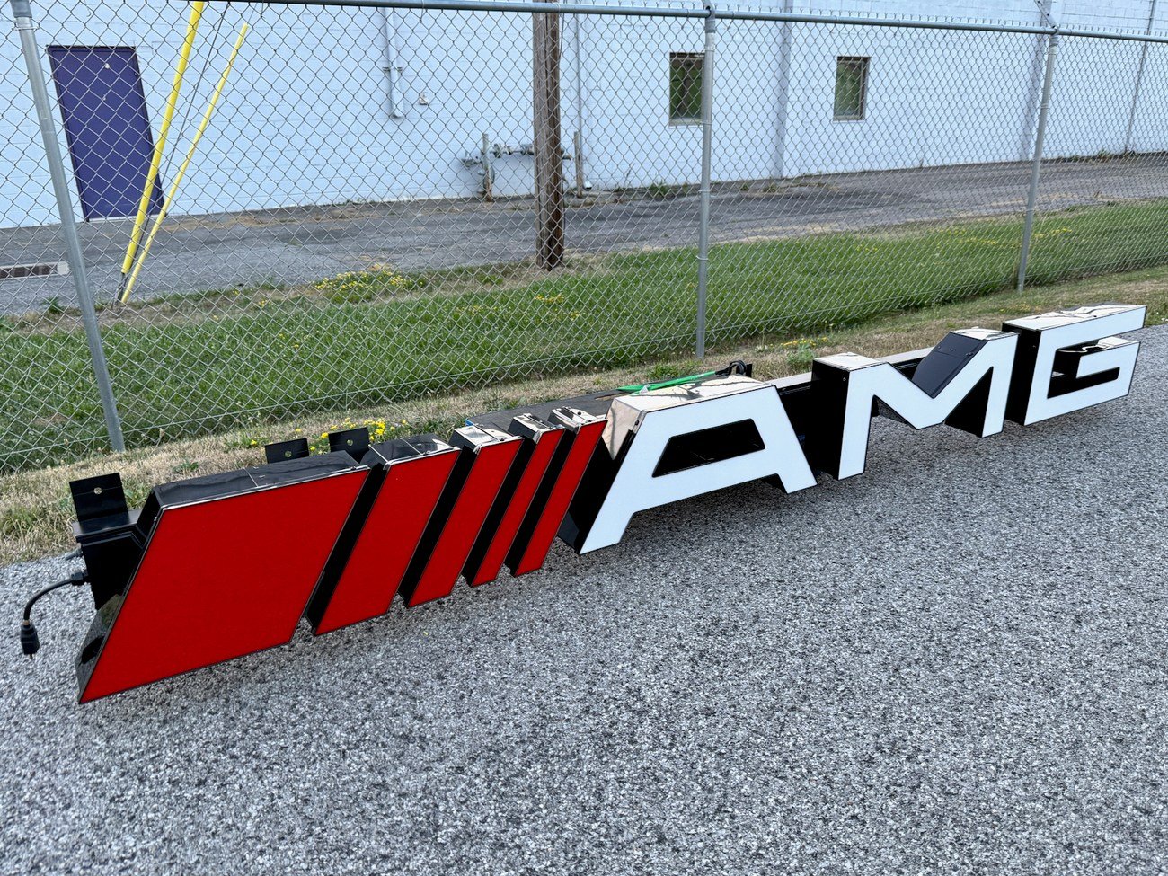Mercedes-AMG illuminated sign